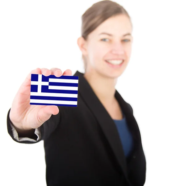 Business woman holding a card with the Greek flag — Stock Photo, Image