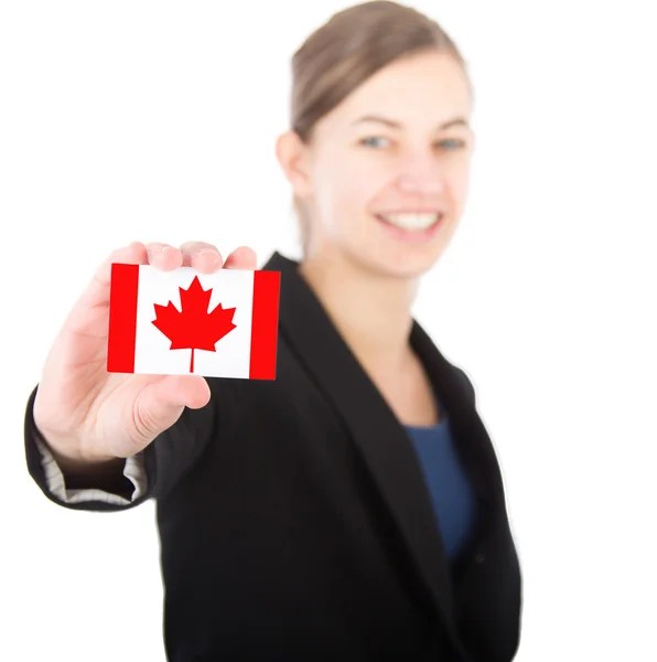 Mulher de negócios segurando um cartão com a bandeira canadense — Fotografia de Stock