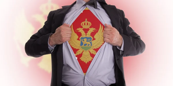 Hombre de negocios con camiseta de bandera montenegrina —  Fotos de Stock