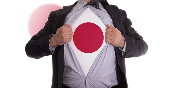 Geschäftsmann mit T-Shirt mit japanischer Flagge — Stockfoto