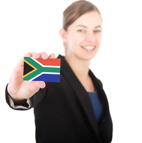 Business woman holding a card with the South African flag — Stock Photo, Image