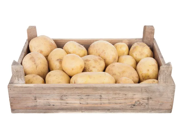 Potatoes in a wooden crate — Stock Photo, Image