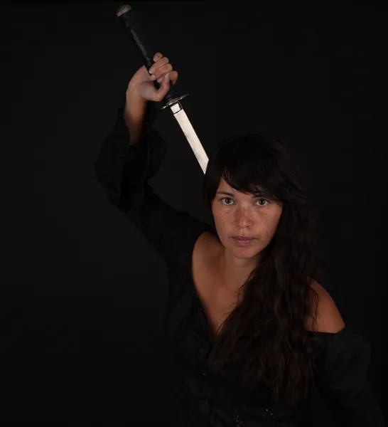 Asian woman grabbing her sword — Stock Photo, Image