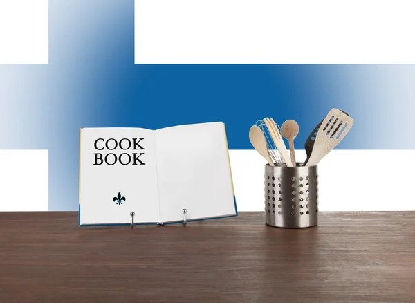 Cookbook and kitchen utensils with finnish flag — Stock Photo, Image