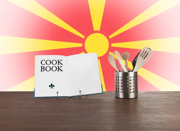 Cookbook and kitchen utensils with Macedonian flag — Stock Photo, Image