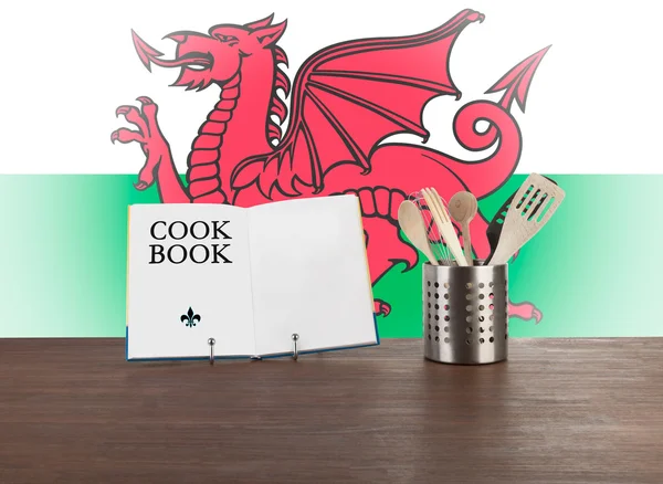 Cookbook and kitchen utensils with Welsh flag — Stock Photo, Image