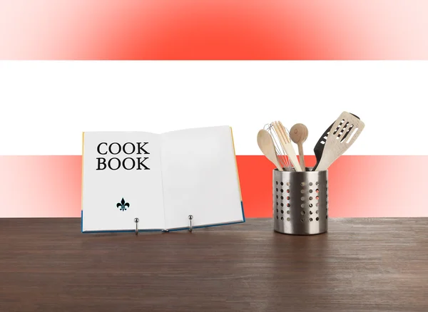 Cookbook and kitchen utensils with Austrian flag — Stock Photo, Image