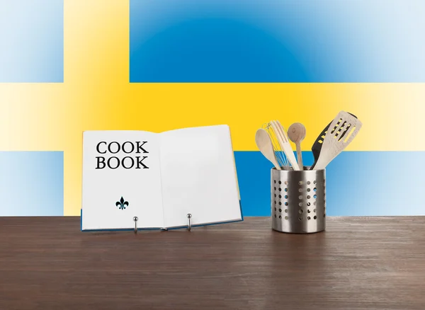 Kuchařka a nádobím s švédská vlajka — Stock fotografie