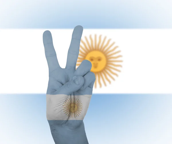 Hand peace sign with flag of Argentina — Stock Photo, Image