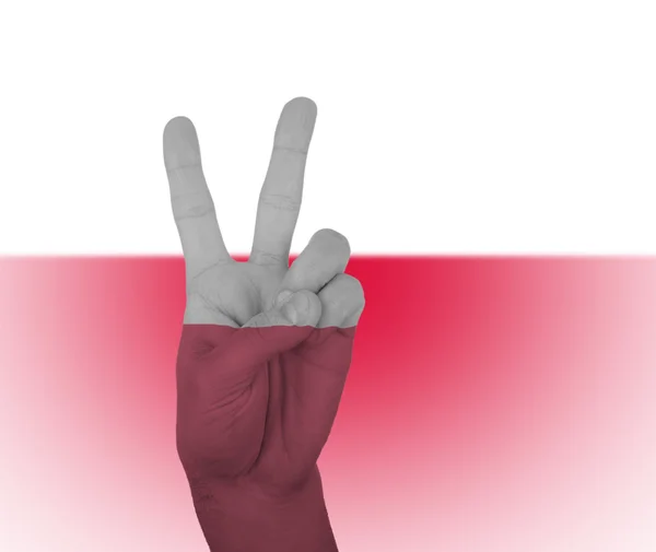 Hand peace sign with flag of Poland — Stock Photo, Image