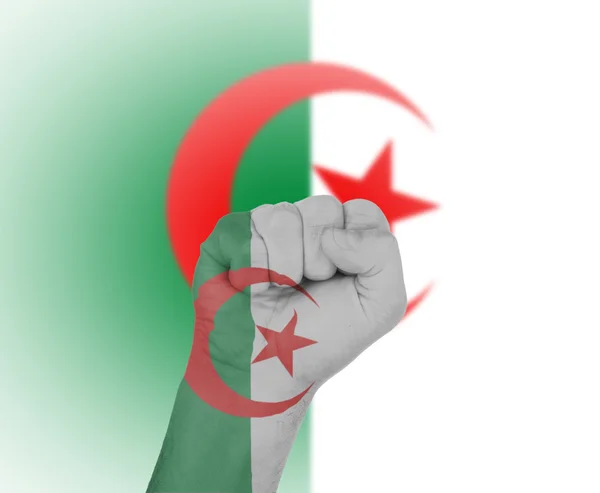 Pugno avvolto nella bandiera di Algeria — Foto Stock