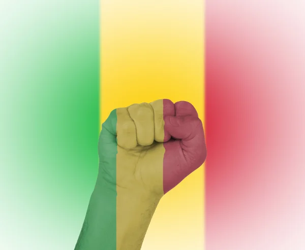 Fist wrapped in the flag of Mali — Stock Photo, Image