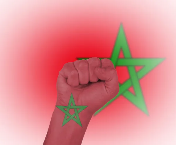 Vuist verpakt in de vlag van Marokko — Stockfoto