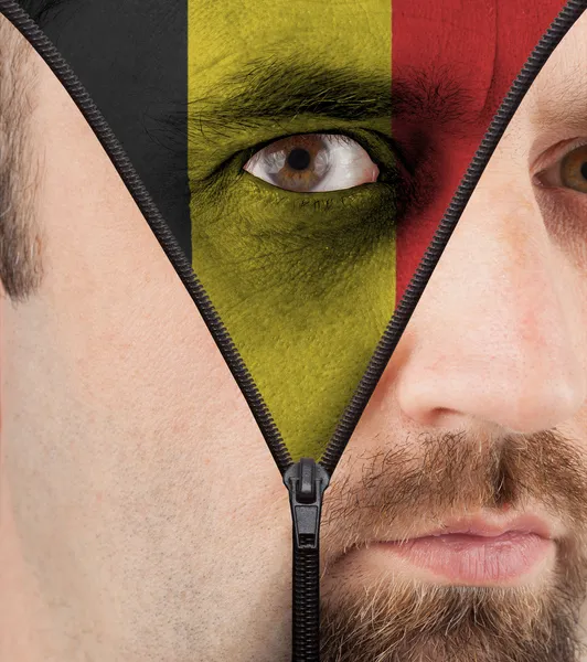 Unzipping face to flag of Belgium — Stock Photo, Image