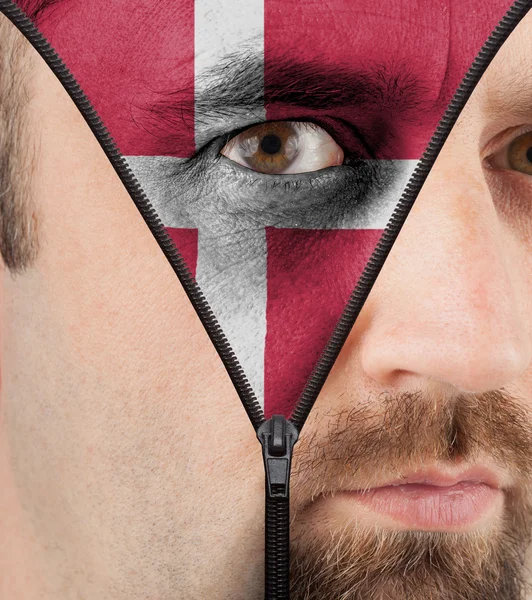 Unzipping face to flag of Denmark — Stock Photo, Image