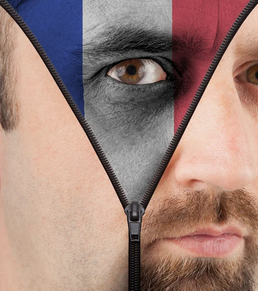 Unzipping face to flag of France — Stock Photo, Image