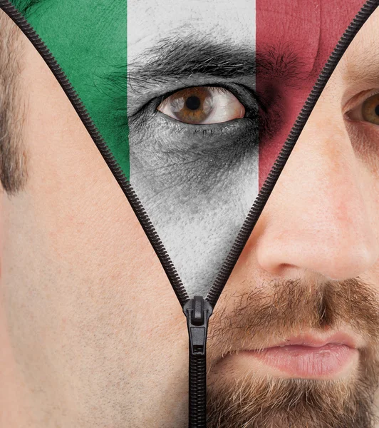 Unzipping ansikte att flagga för Italien — Stockfoto