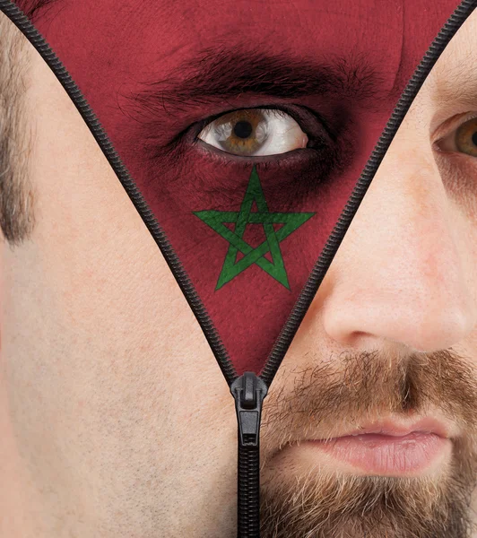 Unzipping face to flag of Morocco — Stock Photo, Image