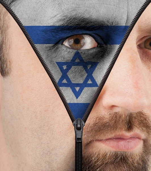 Unzipping face to flag of Israel — Stock Photo, Image