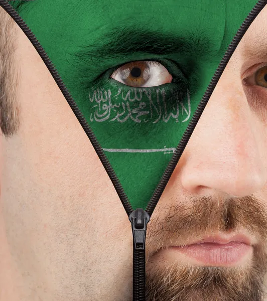 Unzipping ansikte att flagga i Saudiarabien — Stockfoto