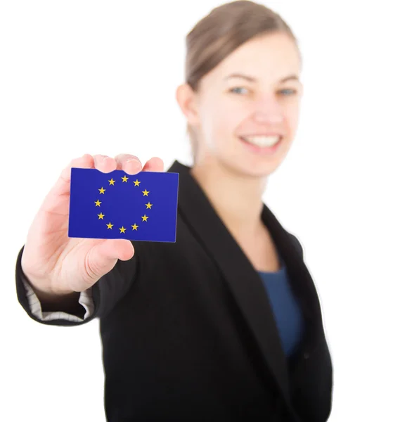 Mulher de negócios segurando um cartão com a bandeira da União Europeia — Fotografia de Stock