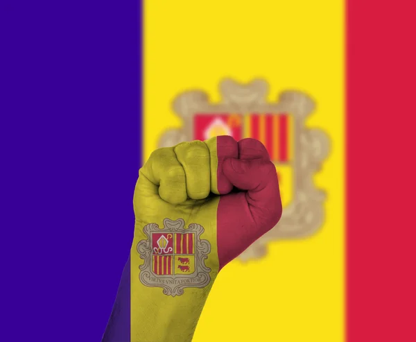 Pugno avvolto nella bandiera di Andorra — Foto Stock