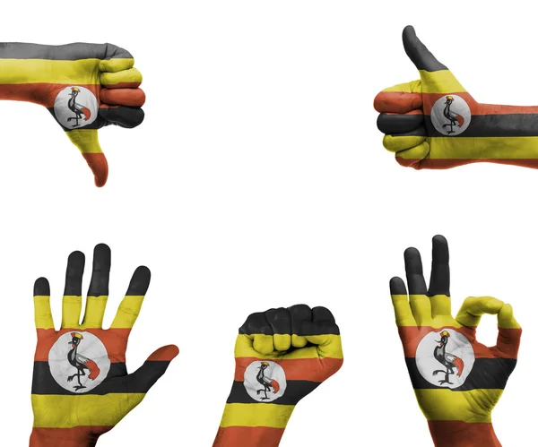 Hand set with the flag of Uganda — Stock Photo, Image