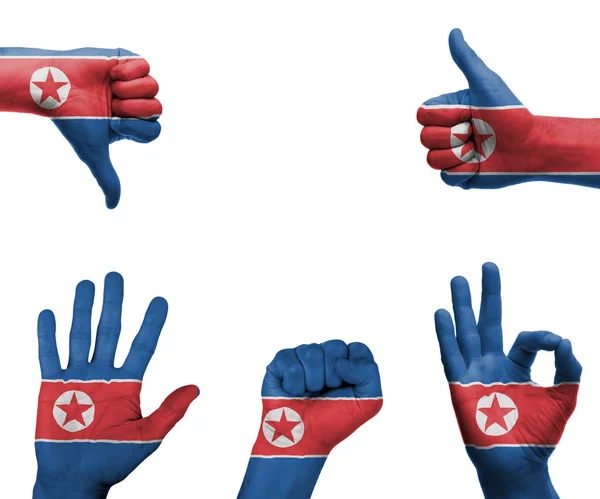 Conjunto de mãos com a bandeira da Coreia do Norte — Fotografia de Stock