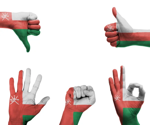 Hand set with the flag of Oman — Stock Photo, Image