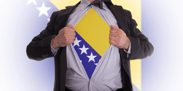 Affärsman med Bosnien och Hercegovinas flagga t-shirt — Stockfoto