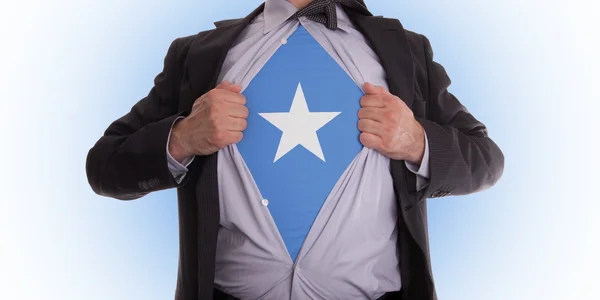 Hombre de negocios con camiseta bandera de Somalia —  Fotos de Stock