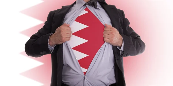 Affärsman med Bahrains flagga t-shirt — Stockfoto