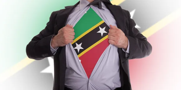 Affärsman med saint kitts och nevis flagga t-shirt — Stockfoto