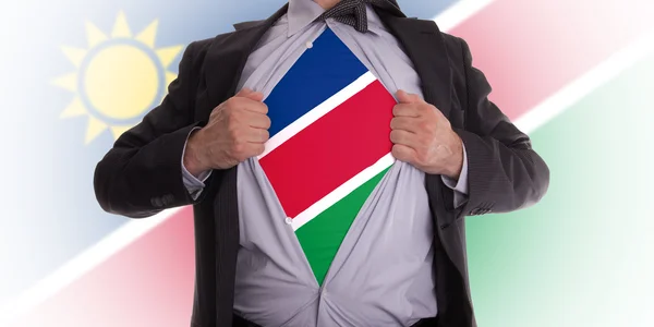 Affärsman med Namibias flagga t-shirt — Stockfoto