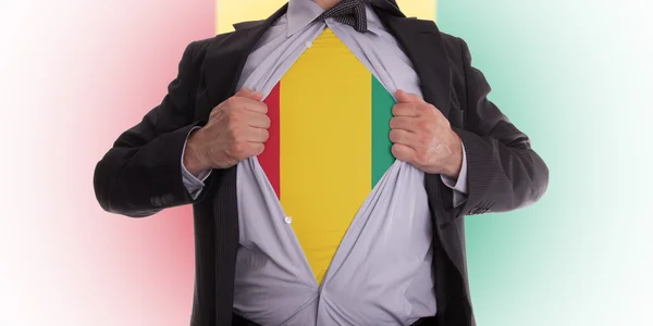 Businessman with Guinea flag t-shirt — Stock Photo, Image