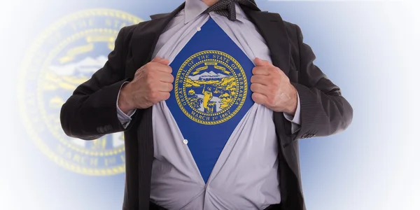Businessman with Nebraska flag t-shirt — Stock Photo, Image