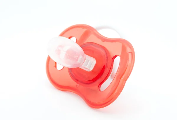 Red pacifier. — Stock Photo, Image