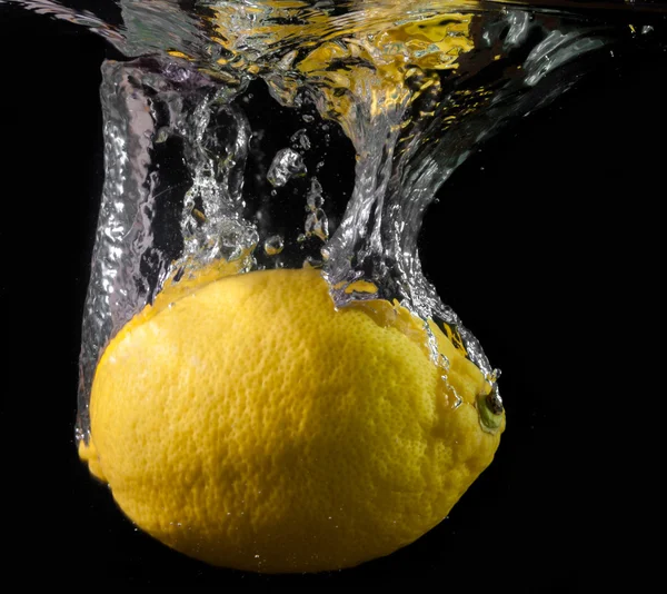 Lemon splash in water. — Stock Photo, Image