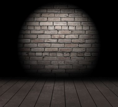 spot ışığı ile tuğla duvar.