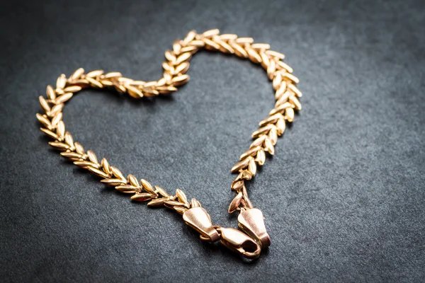 Heart shaped gold chain. — Stock Photo, Image