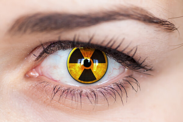 Human eye with radiation symbol.