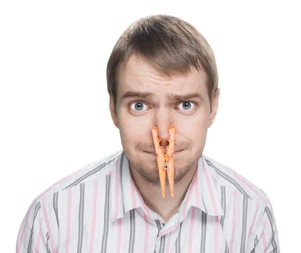 Portrait of man with clothespin. — Stock Photo, Image