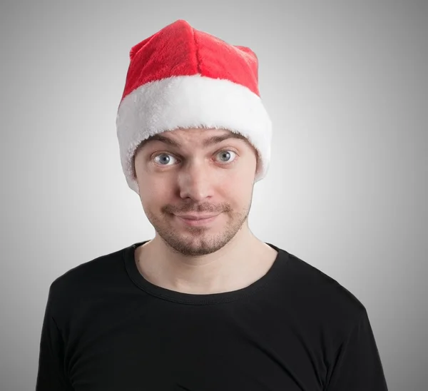 Noel Baba şapkası olan adam. — Stok fotoğraf