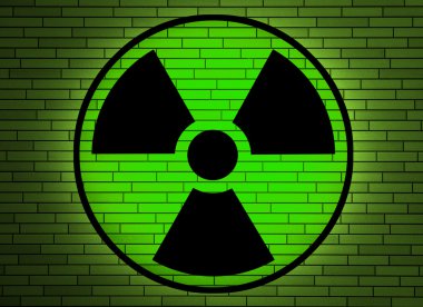Radiation sign on a wall. clipart