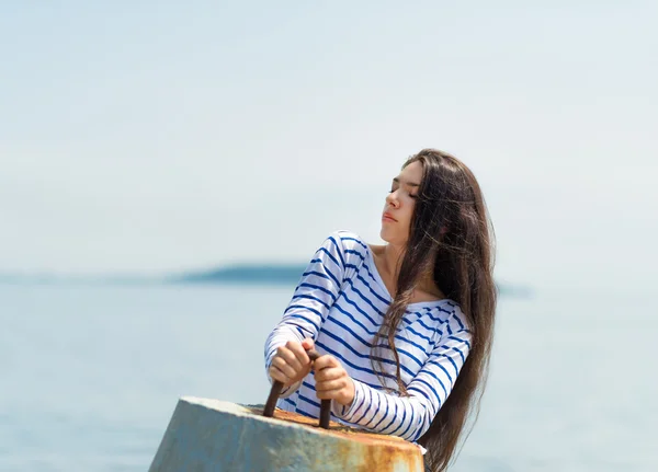 Girl in a striped T-shirt. — Stock Photo, Image