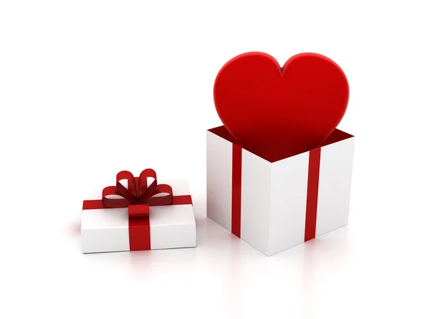 Cuore che vola fuori dalla confezione regalo Foto Stock Royalty Free