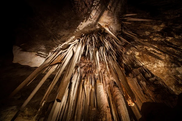 Looking directly up at Stalactite in cave — Stock Photo, Image