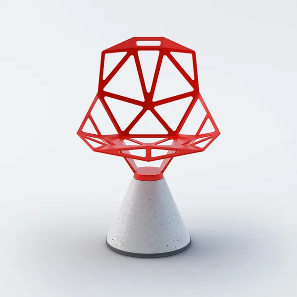 Moderní červená plastová konkrétní židle — Stock fotografie
