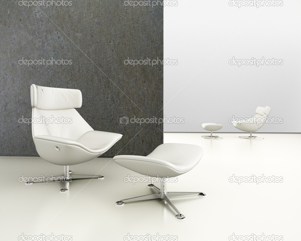 A modern white leather sofa against concrete background on concr