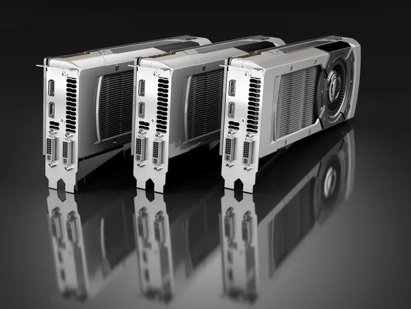 Three Computer graphic cards on black reflective background — Stock Photo, Image